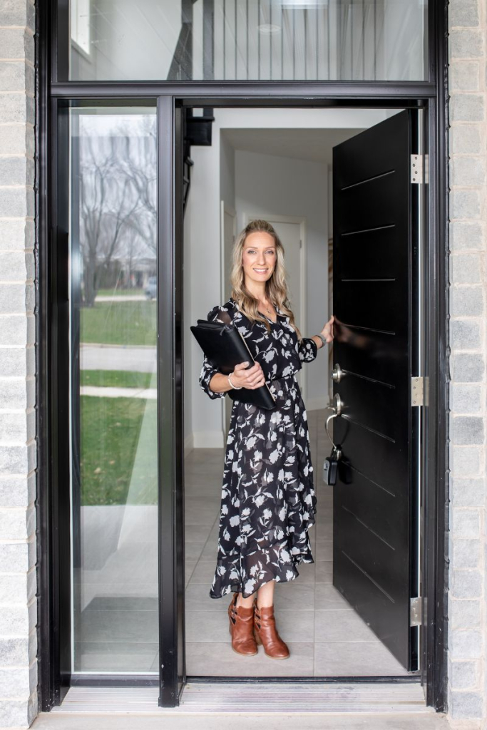 Realtor Jacqueline Clement opening the door